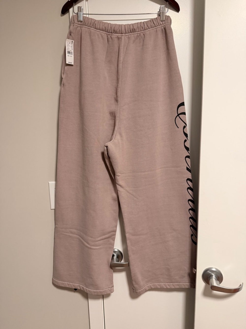 Essentials Men’s Wide-Leg Sweatpants in Dusty Mauve with Black Script
